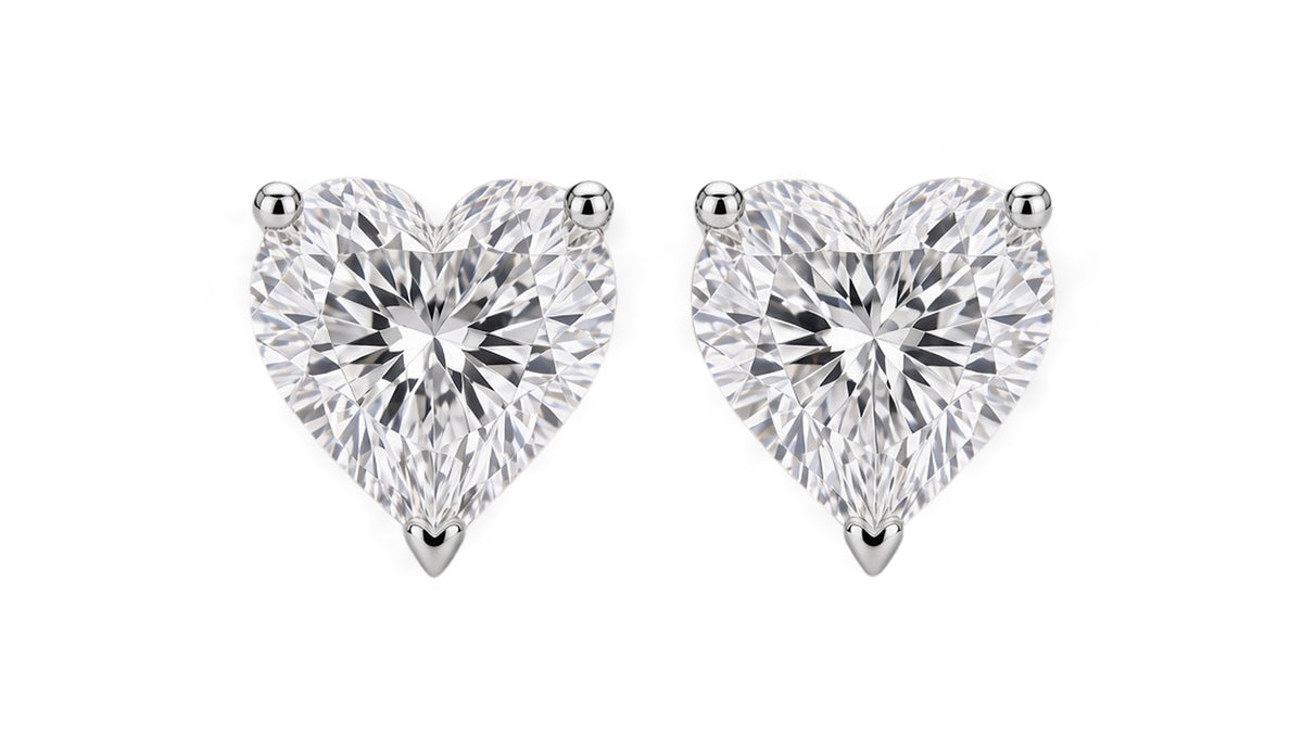 Sterling silver 0.50 CTW lab-grown diamond heart stud earrings — hero front view